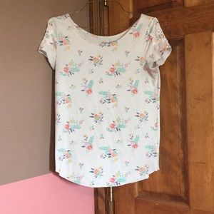 A floral pattern shirt. With embroidered shoulders